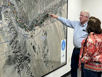Mark Smith examines topographic map